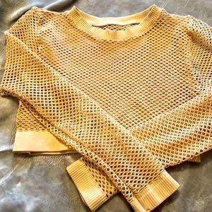 Peek a boo cropped top in cream color